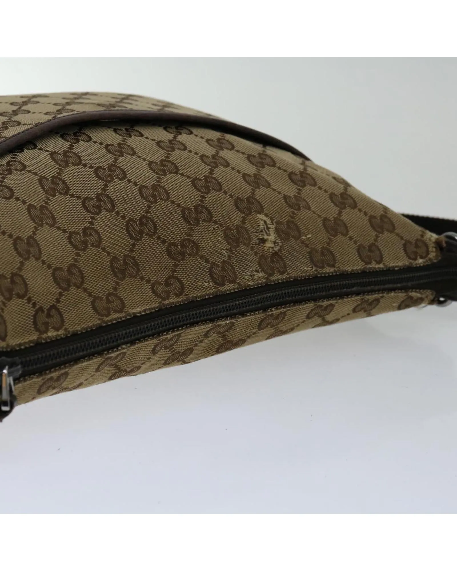 GG Canvas Shoulder Bag with Adjustable Strap and Multiple Pockets