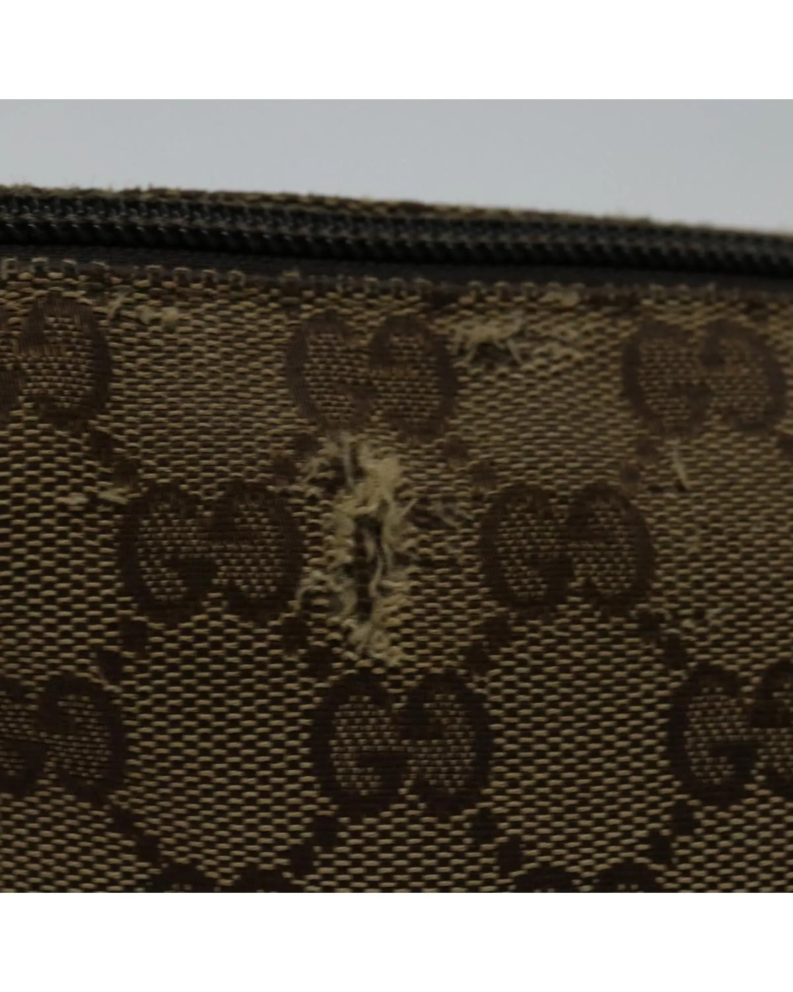 GG Canvas Shoulder Bag with Adjustable Strap and Multiple Pockets