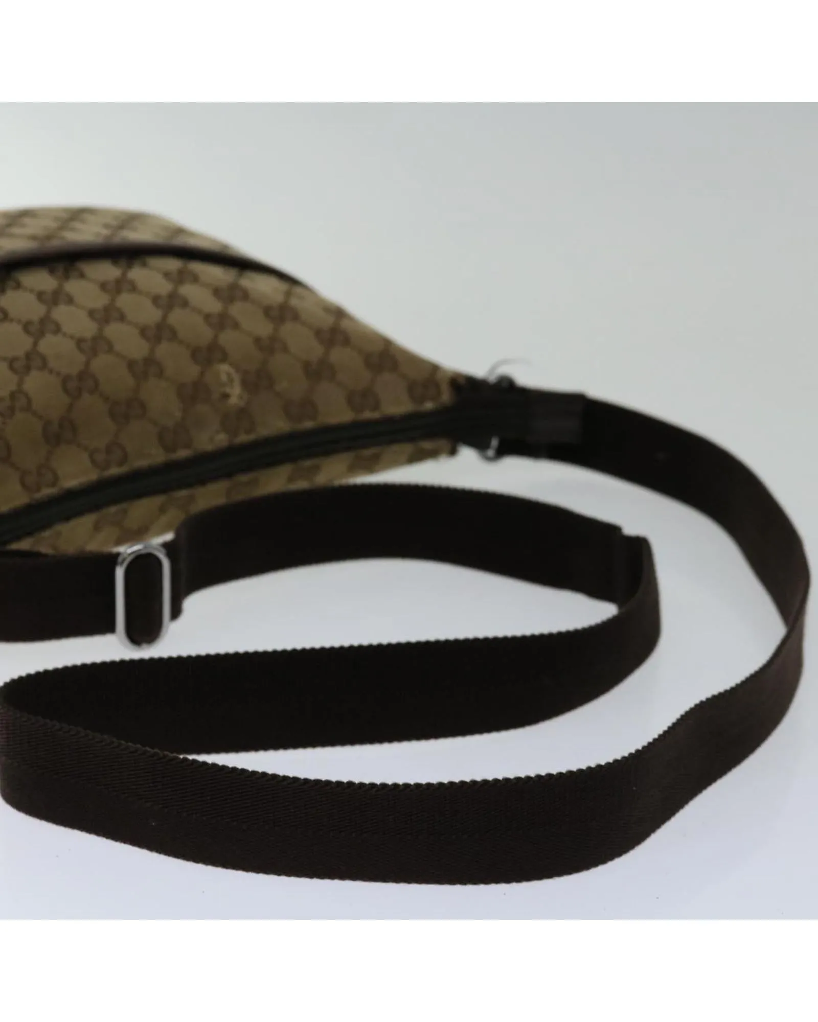GG Canvas Shoulder Bag with Adjustable Strap and Multiple Pockets